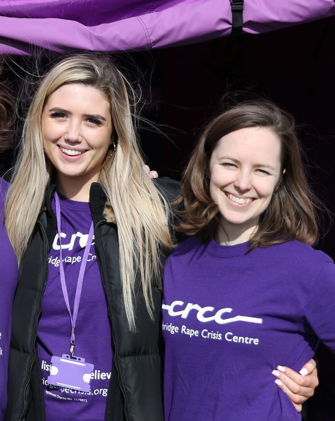 Photo of two fundraising volunteers at an event